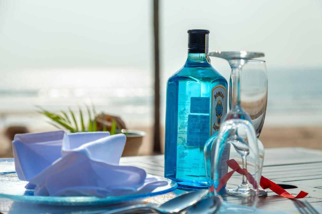 Caravela Beach Resort Varca Eksteriør bilde A bottle of Blue Curaçao
